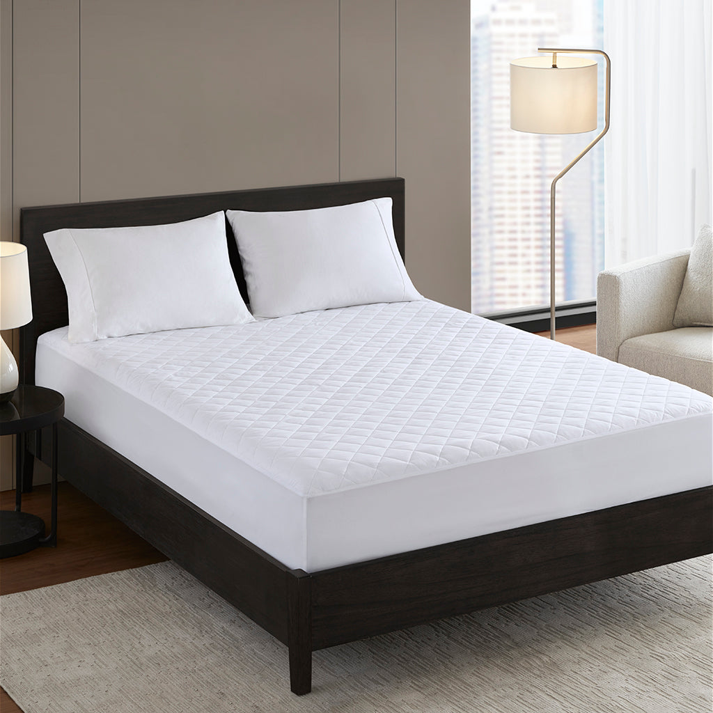 Bed Guardian Essential white waterproof mattress pad with quilted cushioning